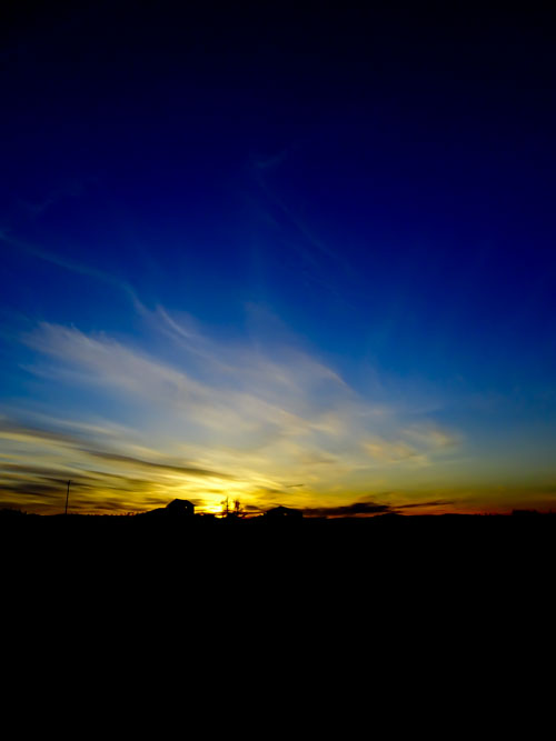 Farmland and sunset